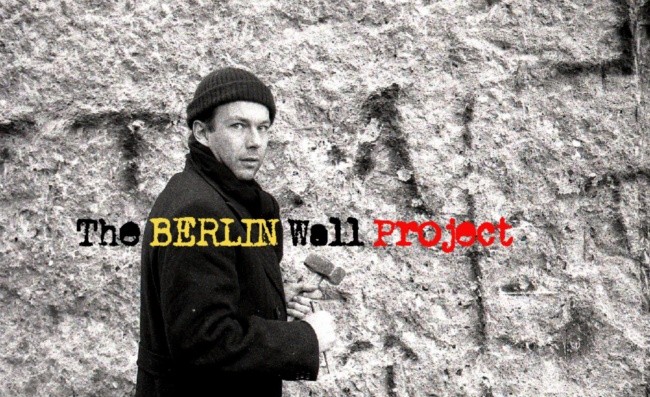 The artist by the Berlin Wall